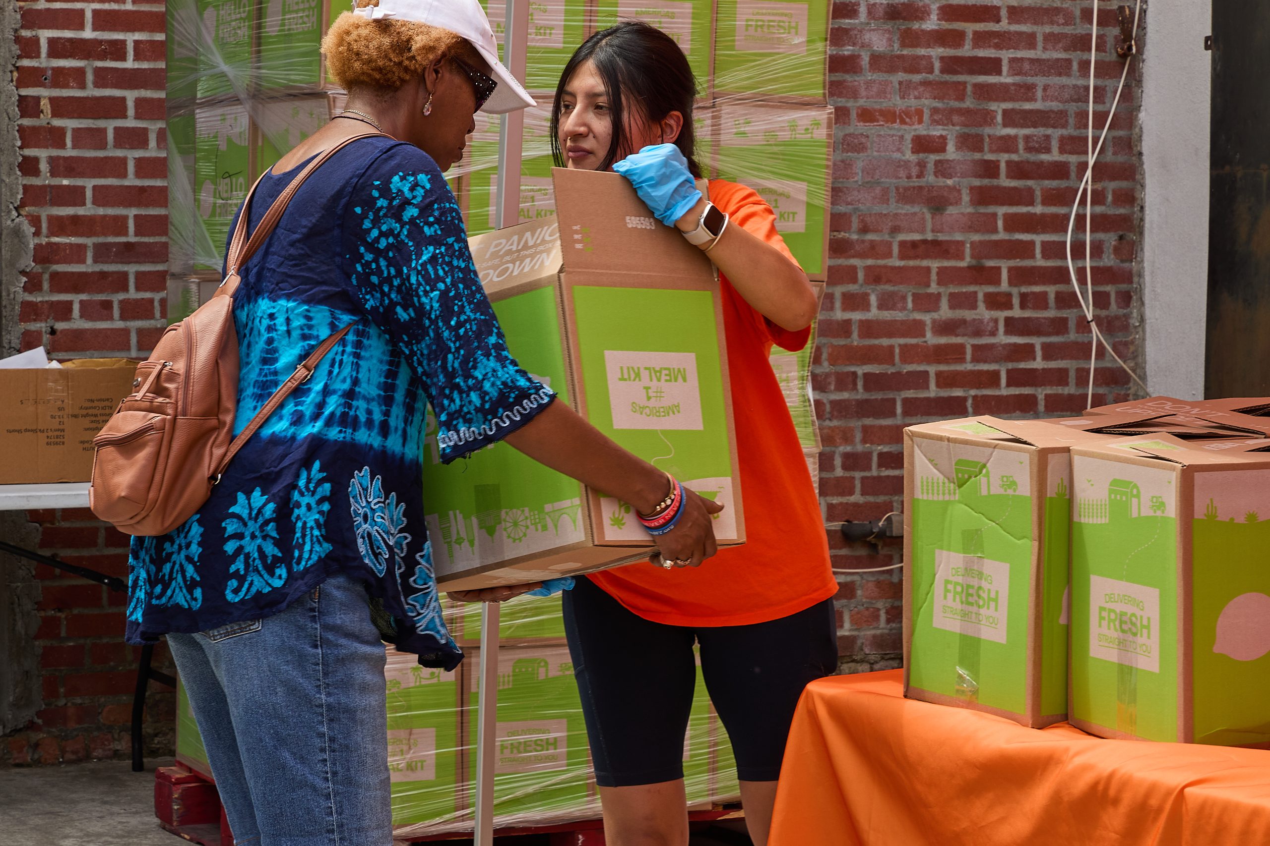 HelloFresh team hands out meals in partnership with No Kid Hungry during their summer road trip to fight childhood hunger