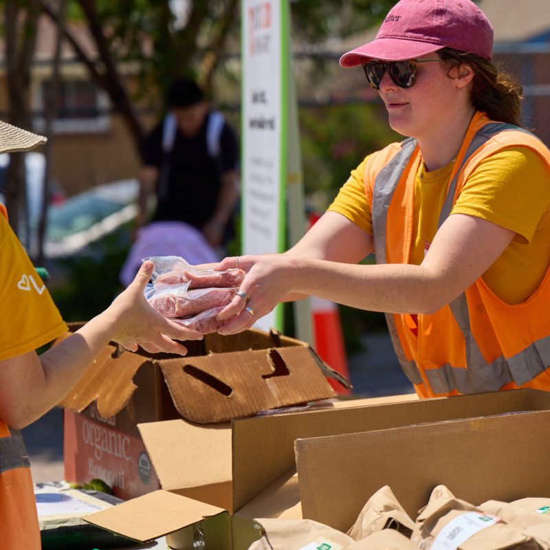 HelloFresh team hands out meals in partnership with No Kid Hungry during their summer road trip to fight childhood hunger