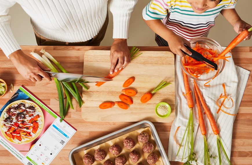 Mom and son cook HelloFresh homemade meal together